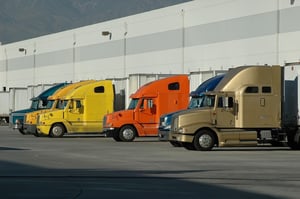 bigstock-Trucks-And-Warehouse-1129204
